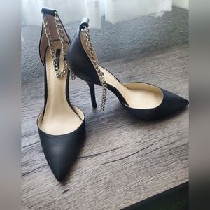 Stiletto heels with chain accent